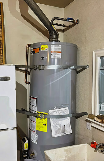https://bassendeanhotwater.com.au/uploads/2025/06/electric-hot-water-system-58767.jpg