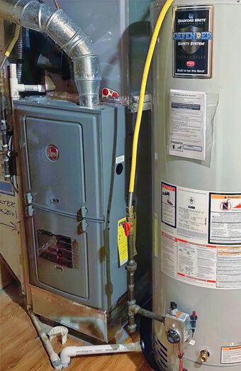 https://bassendeanhotwater.com.au/uploads/2025/06/gas-hot-water-system-89359.jpg